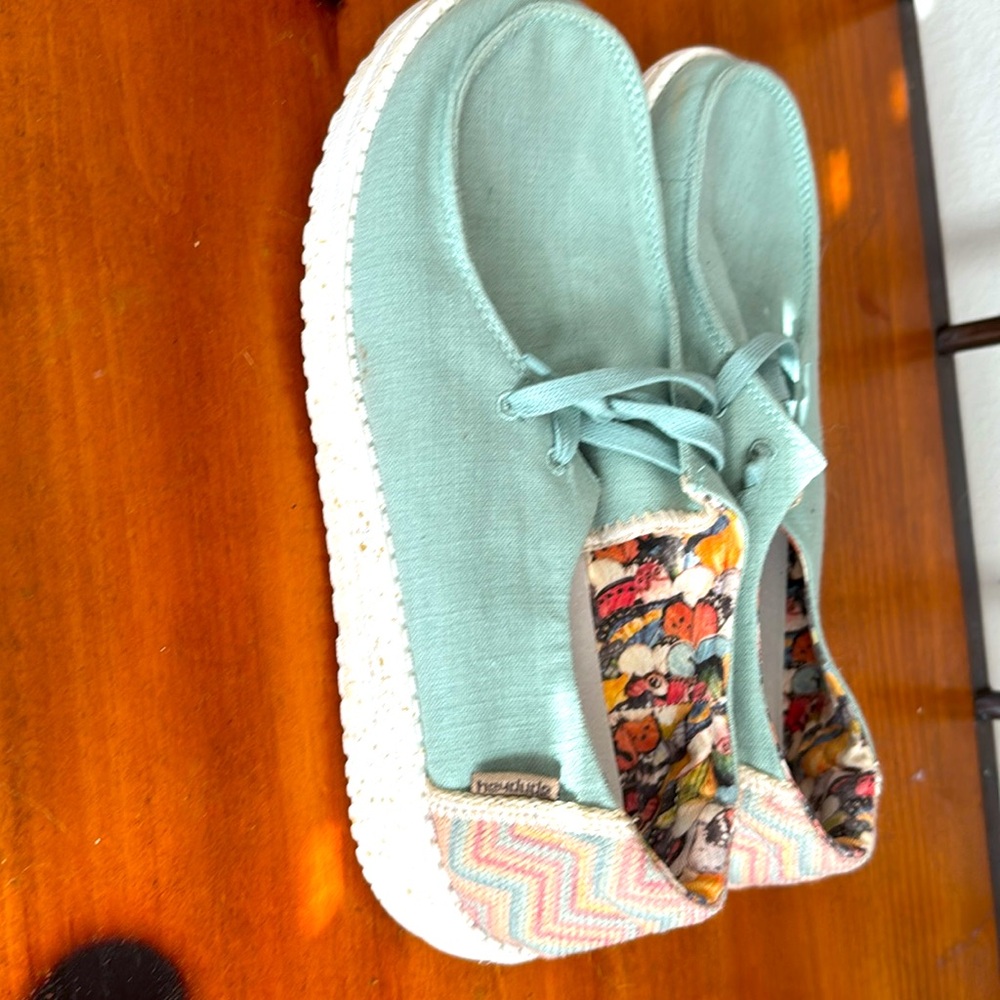 Hey Dude, excellent condition Wendy and the color aloe size 9